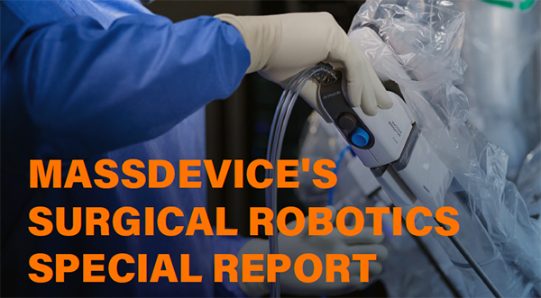 This is a screenshot of the cover of the MassDevice Surgical Robotics Special report which shows an Intuitive da Vinci 5 system in action.